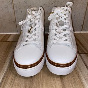 Michael Kors brand white sneakers in a size 6.5. NEVER WORN.